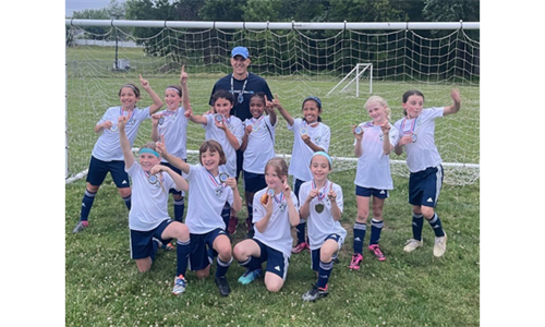 Spartans U9 Girls Win Division Title!